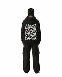 byKapwa Studio | Kapwa Wave Hoodie - Dark | Hoodie Schwarz | Model Frau Rückseite