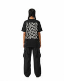 byKapwa Studio | Kapwa Wave Tee - Dark | T-Shirt Schwarz | Model Frau Rückseite