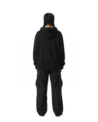 byKapwa Studio | Gold Liquid 3D Kapwa Hoodie - Dark | Hoodie Schwarz | Model Frau Rückseite
