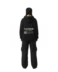 byKapwa Studio | Less Chismis More Kapwa Hoodie - Dark | Hoodie Schwarz | Model Frau Rückseite