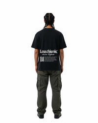 byKapwa Studio | Less Chismis More Kapwa Tee - Dark | T-Shirt Schwarz | Model Mann Rückseite