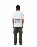 byKapwa Studio | Less Chismis More Kapwa Tee - Light | T-Shirt Weiß | Model Mann Rückseite