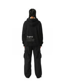 byKapwa Studio | Kapwa Definition Hoodie - Dark | Hoodie Schwarz | Model Frau Rückseite